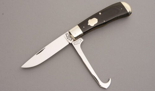A.G. Russell Rider/Trapper Slip Joint with Black Micarta Scales handle material - Obverse Side - Item #KLC07621