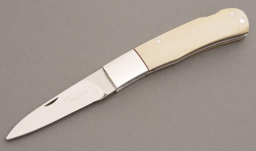 Wayne Clay Lockback with Ivory Micarta handle material - Obverse Side - Item #KLC07709