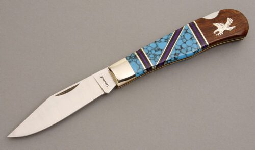 David Yellowhorse Wildlife Series Eagle Lockback with Turquoise & Ironwood handle material - Obverse Side - Item #KLC07851