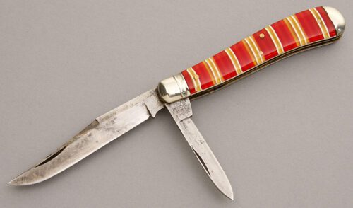 Schrade Cutlery Two Blade Trapper with Candy Stripe Celluloid Scales handle material - Obverse Side - Item #KLC08091