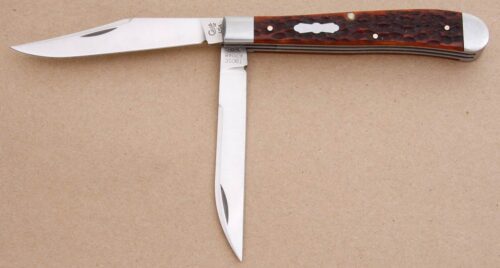 Case Cutlery Tony Bose Slimline Trapper with Jigged Chestnut Bone handle material - Obverse Side - Item #KLC08125