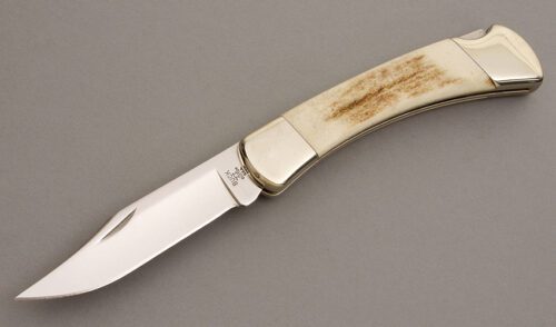 Buck Knives 110 Lockback with Elk Horn Scales handle material - Obverse Side - Item #KLC08128