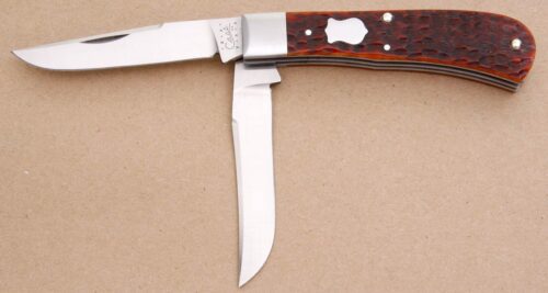 Case Cutlery Tony Bose Millenium Trapper with Jigged Bone handle material - Obverse Side - Item #KLC08137