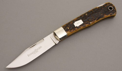 Schatt & Morgan Mountain Man Lockback with Goldenroot Jigged Bone handle material - Obverse Side - Item #KLC08141