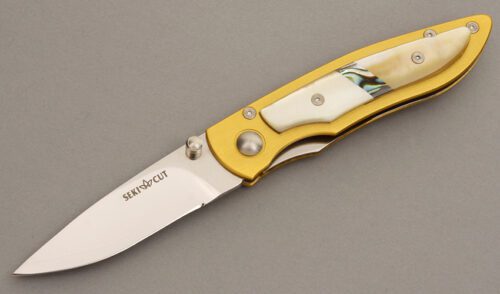 Seki-Cut Knives Linerlock with Gold Anodized Titanium handle material - Obverse Side - Item #KLC08167