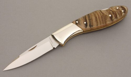 Jim Thompson Lockback with Rams Horn handle material - Obverse Side - Item #KLC08276