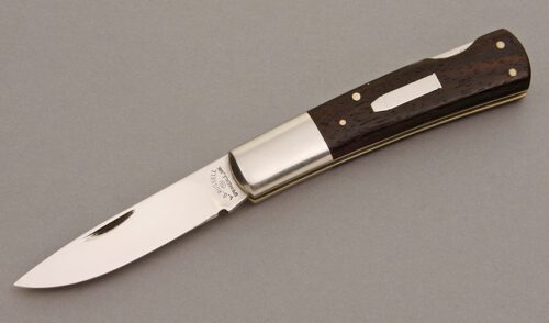 A.G. Russell 110 Lockback with Ebony Wood Scales handle material - Obverse Side - Item #KLC08330