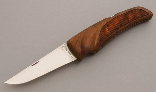 Gerber Knives First Folding Hunter with Checkered Walnut Wood handle material - Obverse Side - Item #KLC08341