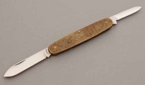 Cattaraugus US-1 Statue of Liberty with Embossed Brass Handle Scales handle material - Obverse Side - Item #KLC08356