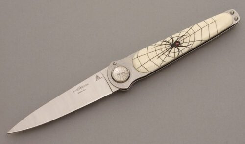 Lone Wolf Knives Paul Defender Axial Lock with CPL Composite W/Spider Etch handle material - Obverse Side - Item #KLC08423