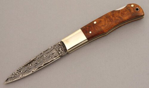 A.G. Russell Damascus Lockback with Quince Wood Scales handle material - Obverse Side - Item #KLC08507