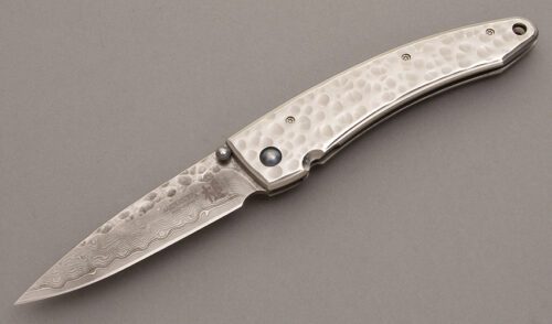Mcusta Knives Small Tsuchi Framelock with Hammered Stainless handle material - Obverse Side - Item #KLC08521