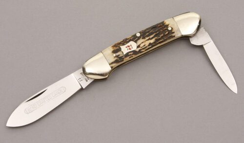 Kissing Crane Canoe with Stag Scales handle material - Obverse Side - Item #KLC08637
