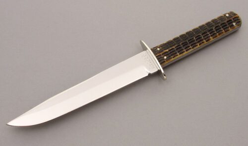 Ka-Bar Knives Clip Point Hunter with Roofline Licorice Jigged Bone handle material - Obverse Side - Item #KLC08646
