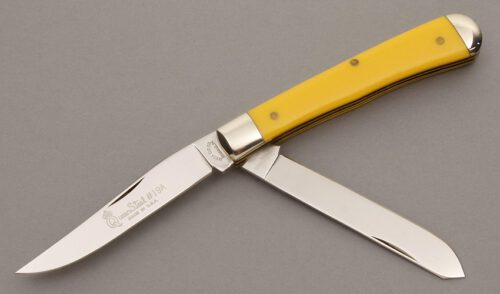 Queen Cutlery Model 19A Trapper with Yellow Delrin handle material - Obverse Side - Item #KLC08656