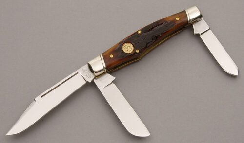 Canal Street Cutlery 3 Blade Reverse Gunstock with Dark Amber Jigged Bone handle material - Obverse Side - Item #KLC08672
