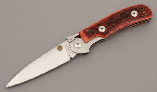 A.G. Russell K87C One Hand Knife with Red Jigged Bone Scales handle material - Obverse Side - Item #KLC08856