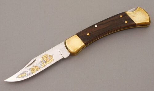 Buck Knives Thomas Jefferson 110 Lockback with Ebony Wood handle material - Obverse Side - Item #KLC08897