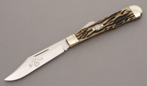 Schatt & Morgan Saddle Horn Lockback with Morning Ash Worm Groove Bone handle material - Obverse Side - Item #KLC08911