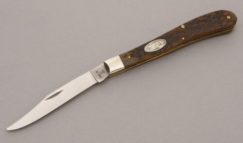 Case Cutlery Slimline Trapper with Jigged Brown Bone handle material - Obverse Side - Item #KLC08928