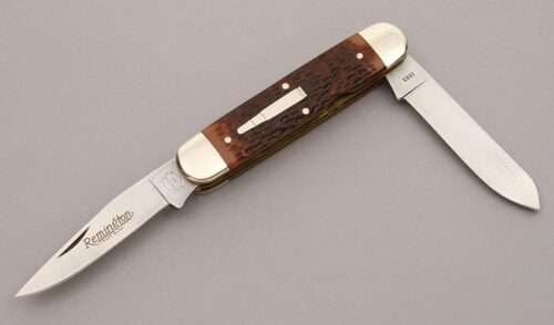 Remington Knives R4353 Woodsman Bullet Knife with Jigged Delrin handle material - Obverse Side - Item #KLC08939