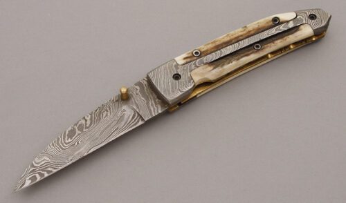 Unknown Maker Wharncliffe Linerlock Folder with Stag Scales handle material - Obverse Side - Item #KLC08979