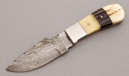 Unknown Maker Hunter with Bone