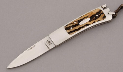 A.G. Russell Ron Lake Tail Lock Folder with Stainless Frame handle material - Obverse Side - Item #KLC08987