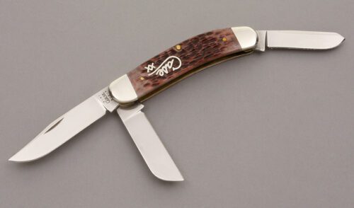 Case Cutlery Tony Bose Design Sowbelly with Cranberry Jigged Bone Scales handle material - Obverse Side - Item #KLC09033