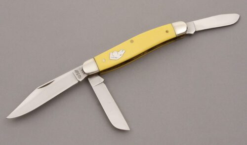 Ka-Bar Knives Dogs Head Stockman with Yellow Delrin handle material - Obverse Side - Item #KLC09034