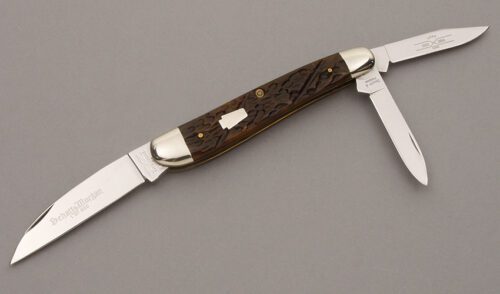 Schatt & Morgan 043054 Dog Leg Whittler with Brown Berry Worm Groove Bone handle material - Obverse Side - Item #KLC09122