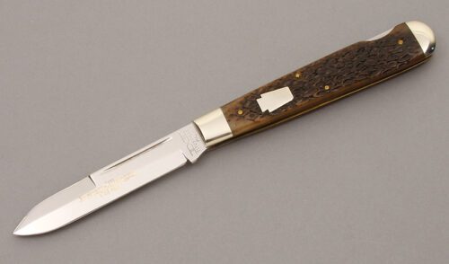 Schatt & Morgan 04111L Jumbo Lockback with Brown Jigged Bone handle material - Obverse Side - Item #KLC09133