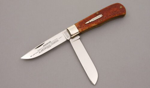 Winchester Knives 29103 Two Blade Trapper with Burnt Orange Jigged Bone handle material - Obverse Side - Item #KLC09147