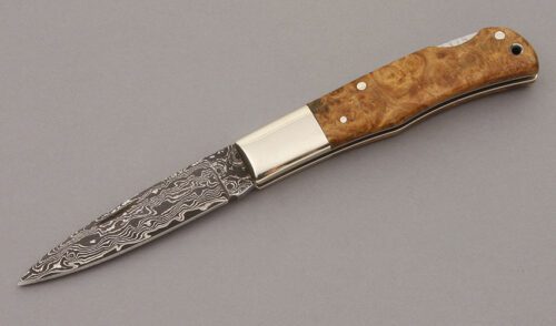 A.G. Russell Damascus Lockback with Quince Wood Scales handle material - Obverse Side - Item #KLC09163