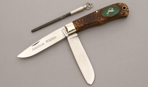 Camillus Cutlery American Wildlife Trapper with Delrin Jigged Bone handle material - Obverse Side - Item #KLC09303