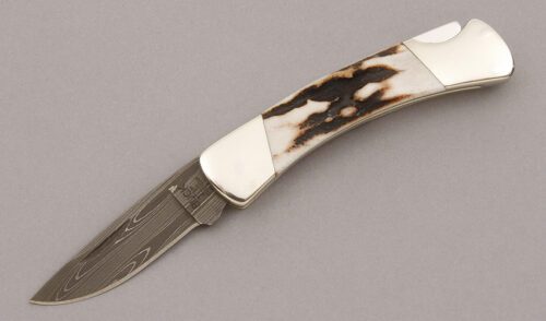 Buck Knives Knight Lockback with Stag Scales handle material - Obverse Side - Item #KLC09380