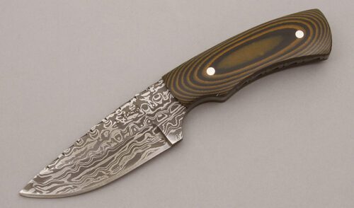 Leonard Toews Hunter with Orange & Black G10 Scales handle material - Obverse Side - Item #KLC09388