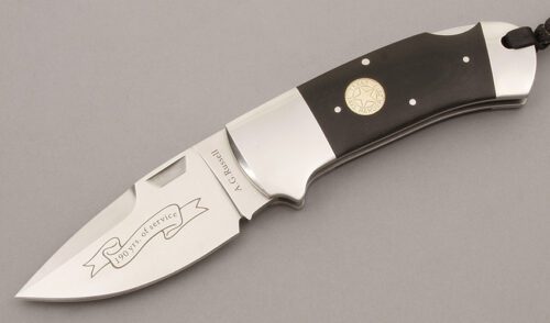 A.G. Russell 2013 Texas Ranger Lockback with Black Linen Rucarta Scales handle material - Obverse Side - Item #KLC09399