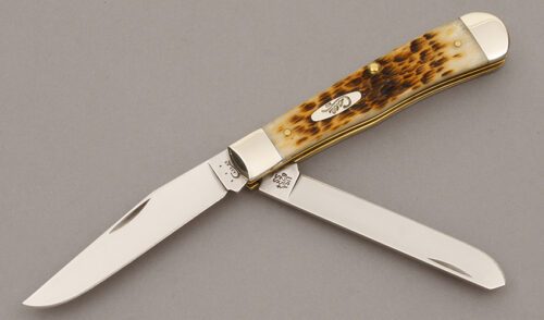 Case Cutlery 6254 Trapper with Amber Jigged Bone handle material - Obverse Side - Item #KLC09437
