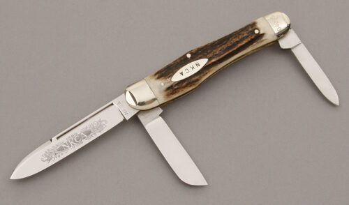 Kissing Crane 1980 NKCA Three Blade Gunstock with Stag Handle Scales handle material - Obverse Side - Item #KLC09445