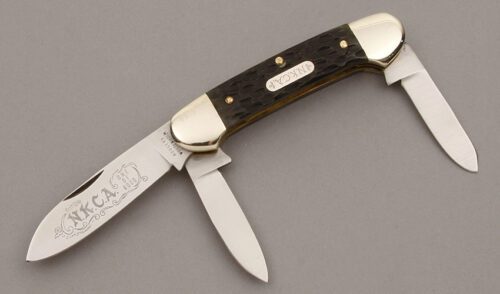 Rodgers Wostneholm Knives 1978 NKCA Three Blade Canoe with Green Jigged Bone Handles handle material - Obverse Side - Item #KLC09446