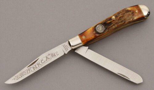 Schrade Cutlery 1982 NKCA Trapper with Burnt Stag Handle Scales handle material - Obverse Side - Item #KLC09452