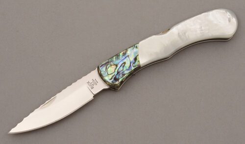 Buck Knives Custom Lockback Folder with Mother of Pearl handle material - Obverse Side - Item #KLC09496