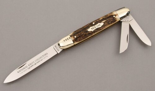 Kissing Crane 1975 NKC & DA Club Whittler with Stag Handle Scales handle material - Obverse Side - Item #KLC09523