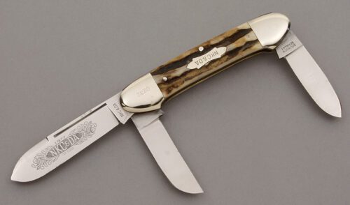 Kissing Crane 1977 NKC & DA Canoe with Stag Handle Scales handle material - Obverse Side - Item #KLC09524
