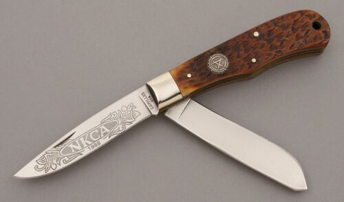 Camillus Cutlery 1988 NKCA Trapper with Jigged Bone Handle Scales handle material - Obverse Side - Item #KLC09525