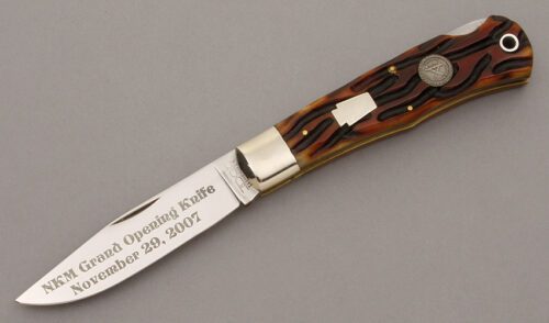 Schatt & Morgan 2007 NKM Mountain Man Lockback with Worm Groove Jigged Bone Scales handle material - Obverse Side - Item #KLC09539