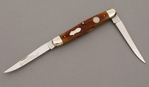 Queen Cutlery NKCA 30th Anniversary Muskrat with Caramel Jigged Bone Scales handle material - Obverse Side - Item #KLC09540