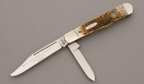 Case Cutlery 1994 NKCA Club Trapper with Rogers Jigged Bone Scales handle material - Obverse Side - Item #KLC09548