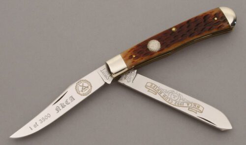 Sargent Knives 1992 NKCA Club Trapper with Brown Jigged Bone Scales handle material - Obverse Side - Item #KLC09555